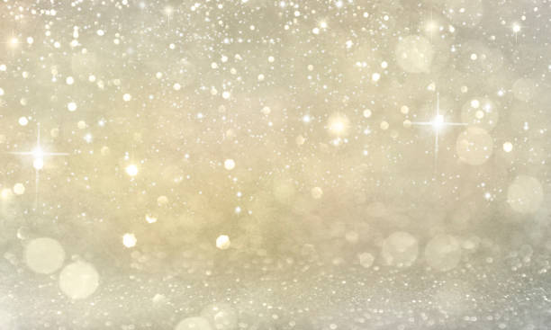 istock Christmas light background.  Holiday glowing backdrop. Defocused Background With Blinking Stars. Blurred Bokeh. 1011983320