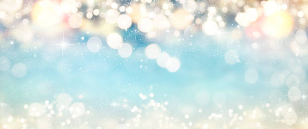 istock Christmas light background.  Holiday glowing backdrop. Defocused Background With Blinking Stars. Blurred Bokeh. 1011984244