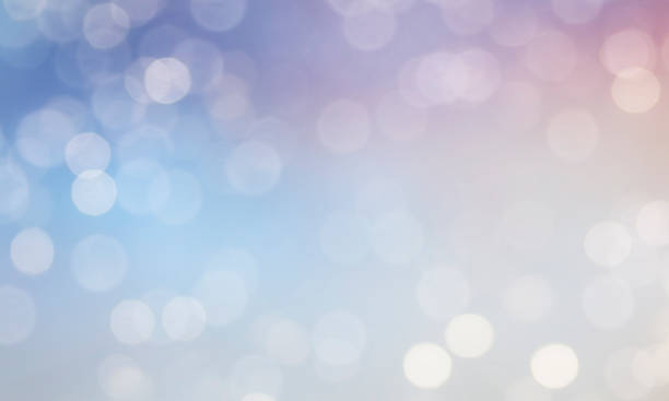 istock Christmas light background.  Holiday glowing backdrop. Defocused Background With Blinking Stars. Blurred Bokeh. 1011987042
