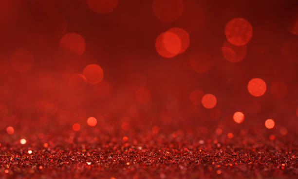 istock Christmas light background.  Holiday glowing backdrop. Defocused Background With Blinking Stars. Blurred Bokeh. 1011987090