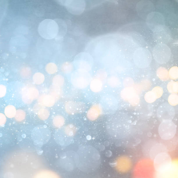 istock Christmas light background.  Holiday glowing backdrop. Defocused Background With Blinking Stars. Blurred Bokeh. 1011989328