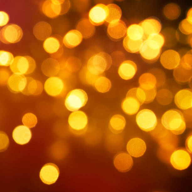 istock Christmas light background.  Holiday glowing backdrop. Defocused Background With Blinking Stars. Blurred Bokeh. 1011989474