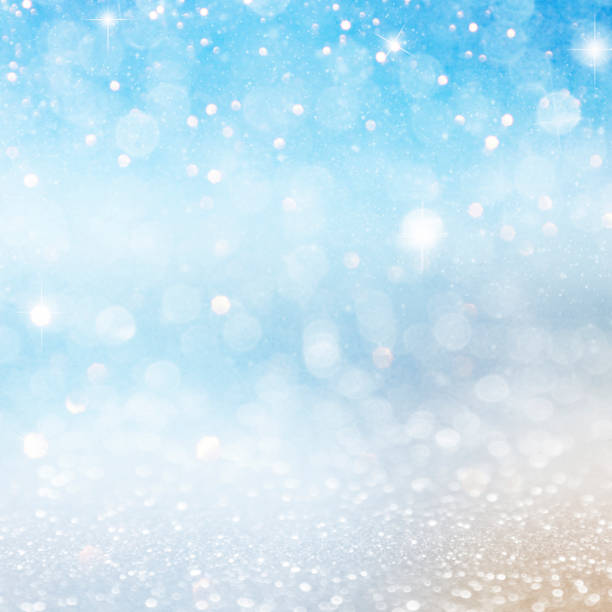 istock Christmas light background.  Holiday glowing backdrop. Defocused Background With Blinking Stars. Blurred Bokeh. 1011989488