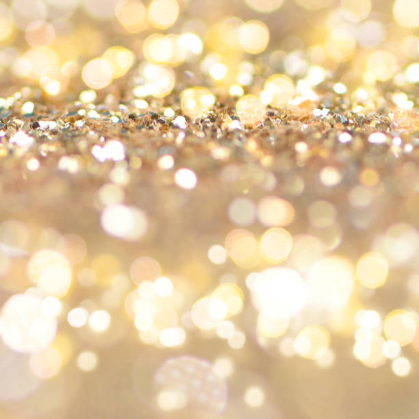 istock Christmas light background.  Holiday glowing backdrop. Defocused Background With Blinking Stars. Blurred Bokeh. 1011991830