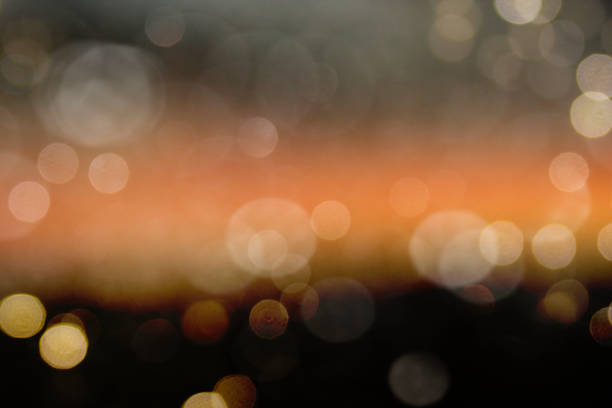 Christmas light background.  Holiday glowing backdrop. Defocused Background With Blinking Stars. Blurred Bokeh.