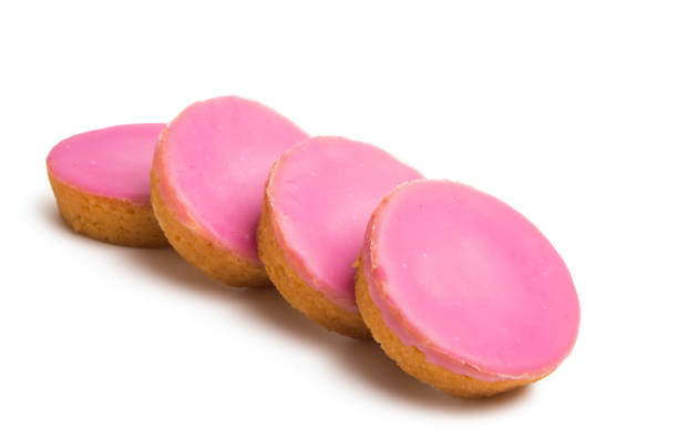 istock Dutch biscuit in pink glaze isolated 1011996260