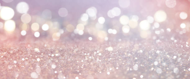 istock Christmas light background.  Holiday glowing backdrop. Defocused Background With Blinking Stars. Blurred Bokeh. 1011996584