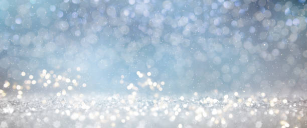 istock Christmas light background.  Holiday glowing backdrop. Defocused Background With Blinking Stars. Blurred Bokeh. 1011998262