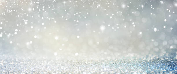 istock Christmas light background.  Holiday glowing backdrop. Defocused Background With Blinking Stars. Blurred Bokeh. 1011998288