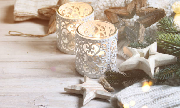 istock Cosy and soft winter background, knitted sweater and lights 1011998420