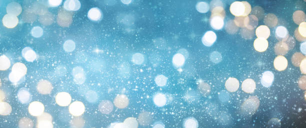 istock Christmas light background.  Holiday glowing backdrop. Defocused Background With Blinking Stars. Blurred Bokeh. 1011998452