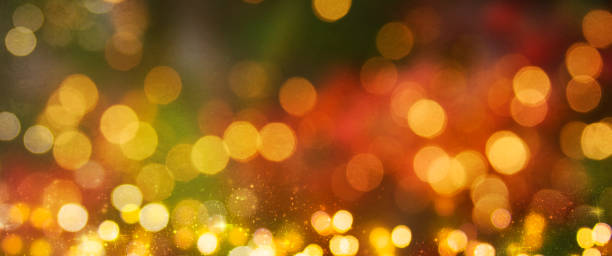 istock Christmas light background.  Holiday glowing backdrop. Defocused Background With Blinking Stars. Blurred Bokeh. 1012003280