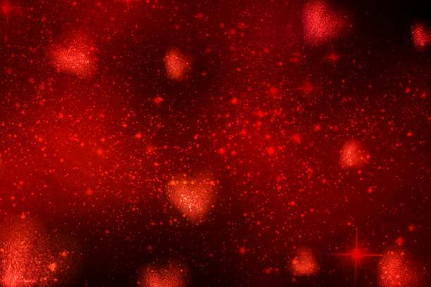 istock Valentines Day light background.  Holiday glowing backdrop. Defocused Background With Blinking Stars. Blurred Bokeh. 1012004596