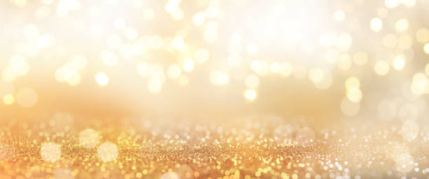 istock Christmas light background.  Holiday glowing backdrop. Defocused Background With Blinking Stars. Blurred Bokeh. 1012004786