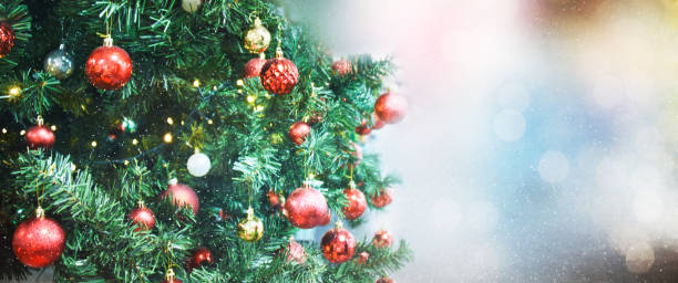 istock Christmas and New Year light background.  Holiday glowing backdrop. Defocused Background With Blinking Stars. Blurred Bokeh. 1012004996