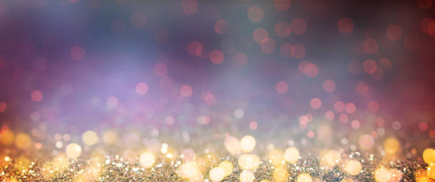 istock Christmas light background.  Holiday glowing backdrop. Defocused Background With Blinking Stars. Blurred Bokeh. 1012009416