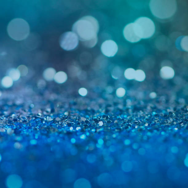 istock Christmas light background.  Holiday glowing backdrop. Defocused Background With Blinking Stars. Blurred Bokeh. 1012009520