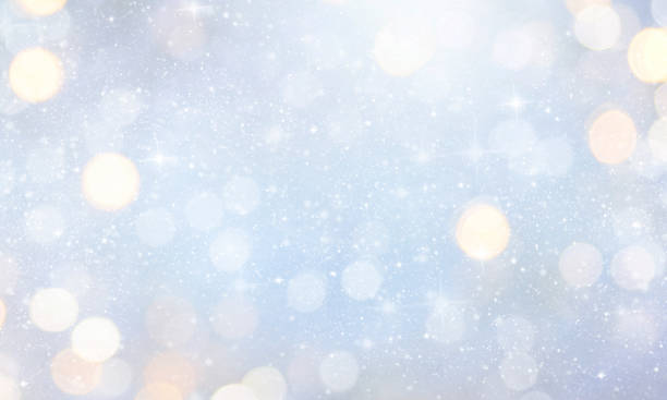 istock Christmas light background.  Holiday glowing backdrop. Defocused Background With Blinking Stars. Blurred Bokeh. 1012010676