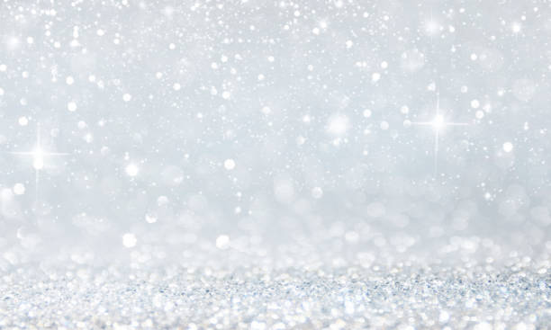 istock Christmas light background.  Holiday glowing backdrop. Defocused Background With Blinking Stars. Blurred Bokeh. 1012010726