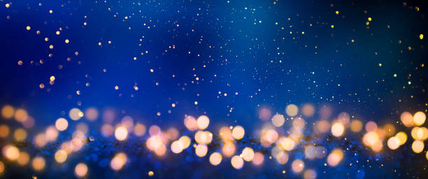 istock Christmas light background.  Holiday glowing backdrop. Defocused Background With Blinking Stars. Blurred Bokeh. 1012010862