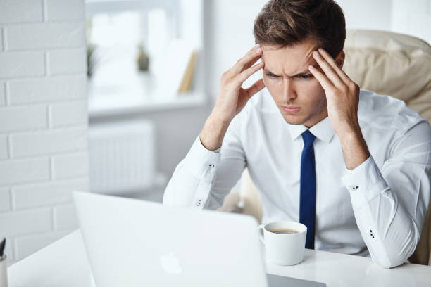 istock Young handsome businessman has a stressfull situation 1012011274
