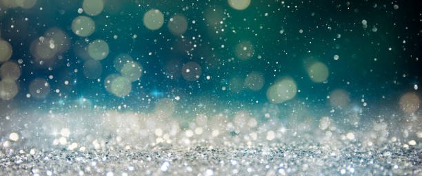 istock Christmas light background.  Holiday glowing backdrop. Defocused Background With Blinking Stars. Blurred Bokeh. 1012014104