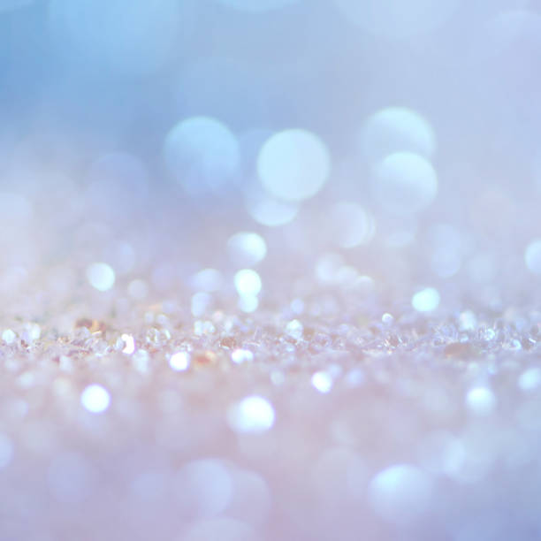 istock Christmas light background.  Holiday glowing backdrop. Defocused Background With Blinking Stars. Blurred Bokeh. 1012015428