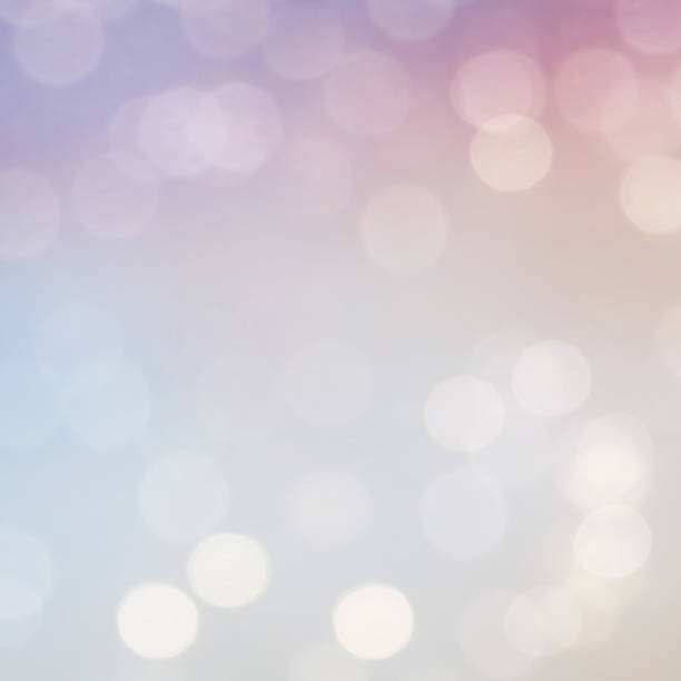 istock Christmas light background.  Holiday glowing backdrop. Defocused Background With Blinking Stars. Blurred Bokeh. 1012015660
