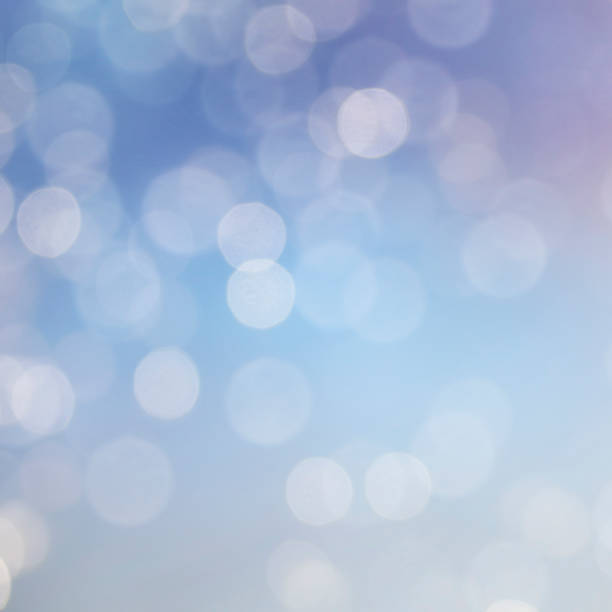 istock Christmas light background.  Holiday glowing backdrop. Defocused Background With Blinking Stars. Blurred Bokeh. 1012015674