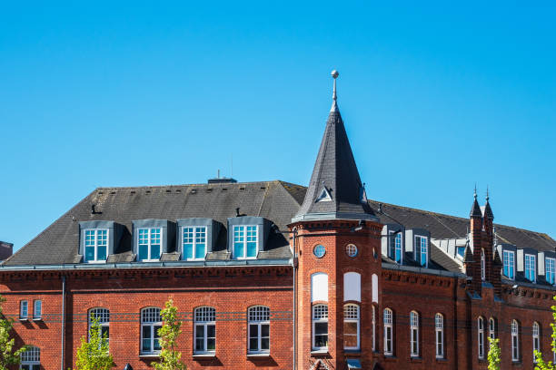 istock Buildings with blue sky in Warnemuende, Germany 1012032180