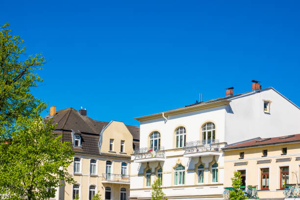 istock Buildings with blue sky in Warnemuende, Germany 1012032182