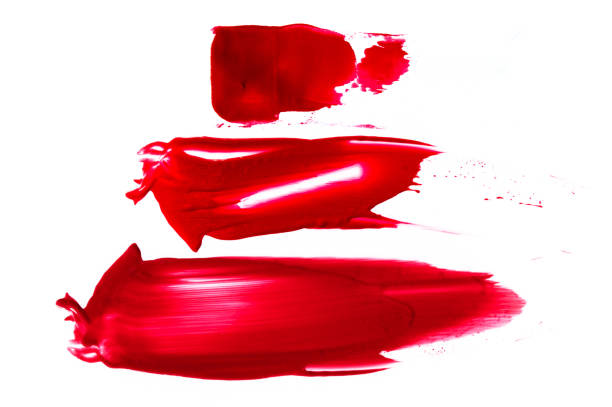 istock Real liquid color paint stamps. Textured surface isolated on white background. Shiny light glossy reflections. Minimalistic flat lay picture. 1012048370