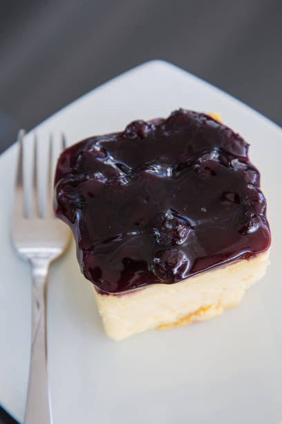 Strawberry cheese cake on plate with fork