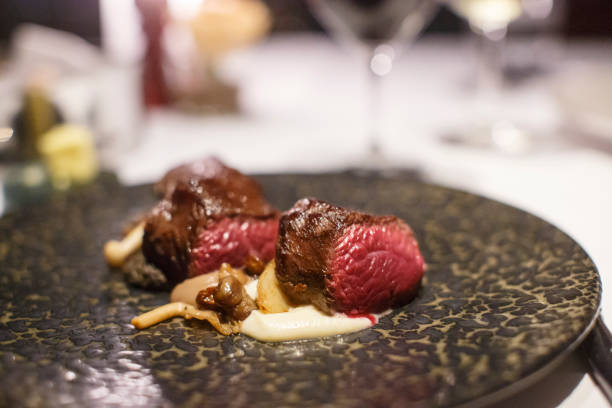 istock Rare Grilled Beef Tenderloin at a fine restaurant dinner setting 1012083796