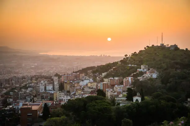 Photo of Beautiful viewpoint of Barcelona at sunrise, natural location in spring.