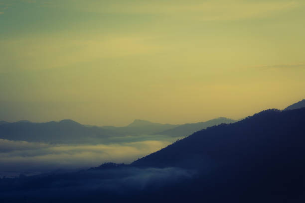 istock Dawn Landscape mountain view with fog. 1012091092