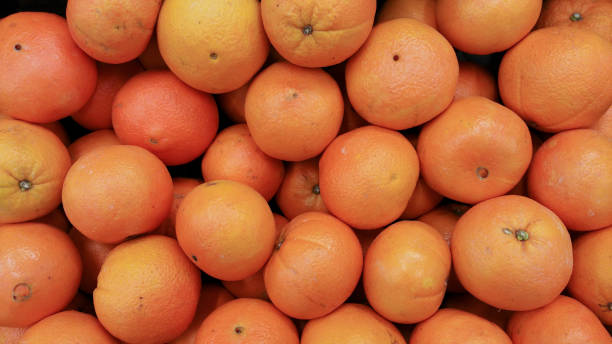 istock Tangerines for sale on the market 1012094664