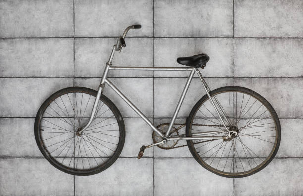 istock old vintage bicycle on the concrete floor 1012100202