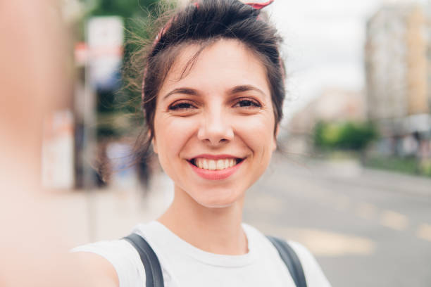 istock Smiling woman making a selfie 1012104246