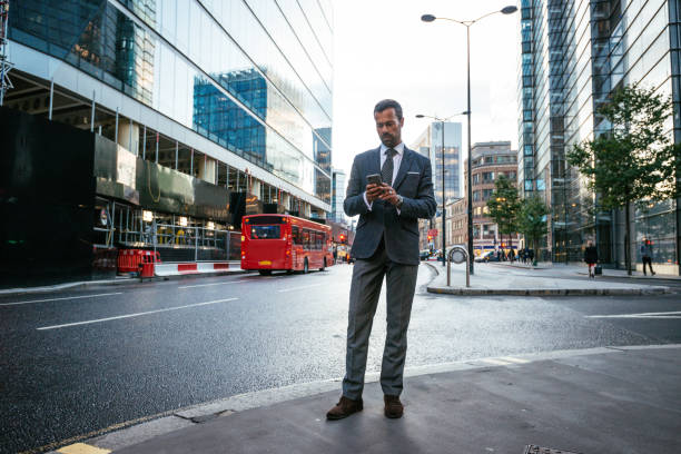 istock Investor using taxi mobile app 1012122388
