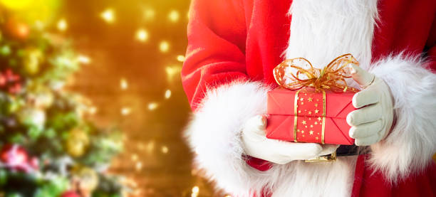 istock Santa Claus with gift box 1012129866