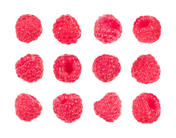 istock Set of fresh raspberries isolated on white background 1012138928