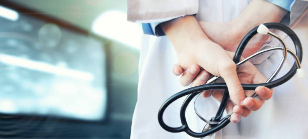 istock Doctor with a stethoscope in the hands 1012145392