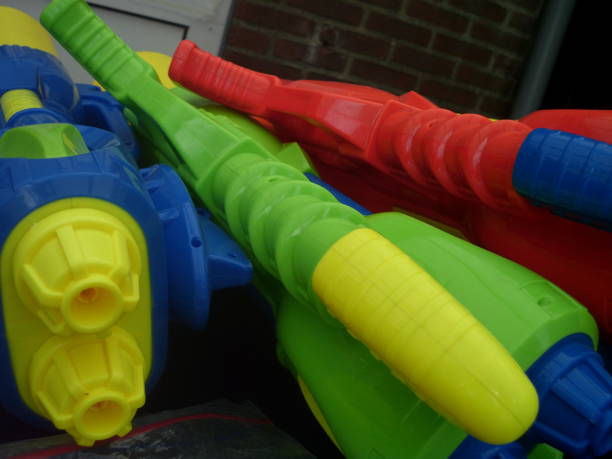 istock Colorful gigantic plastic water guns 1012145876