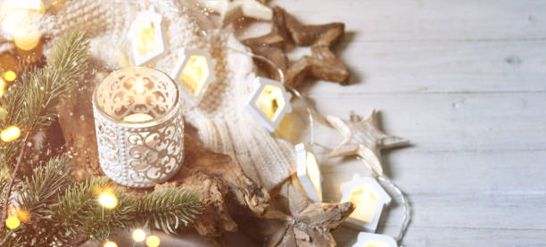 istock Cosy and soft winter background, knitted sweater and lights 1012145916