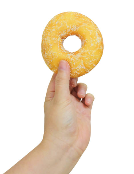 istock Hand Holding Delicious Glazed Donut with Sugar 1012151588