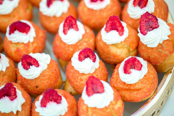 istock close up of profiteroles with cream 1012161456
