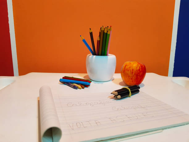 istock Sheets drawn with crayons and various color Pencils school image and text back to school 1012162242