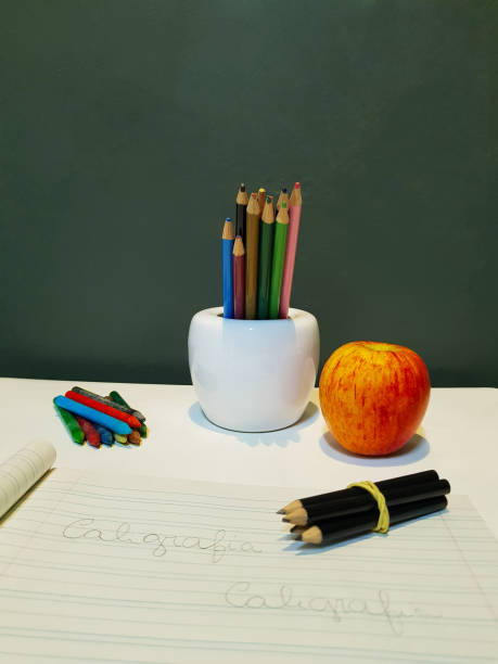 istock Sheets drawn with crayons and various color Pencils school image and text back to school 1012162268