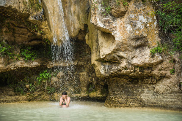 istock Girl taking back in a river 1012167346